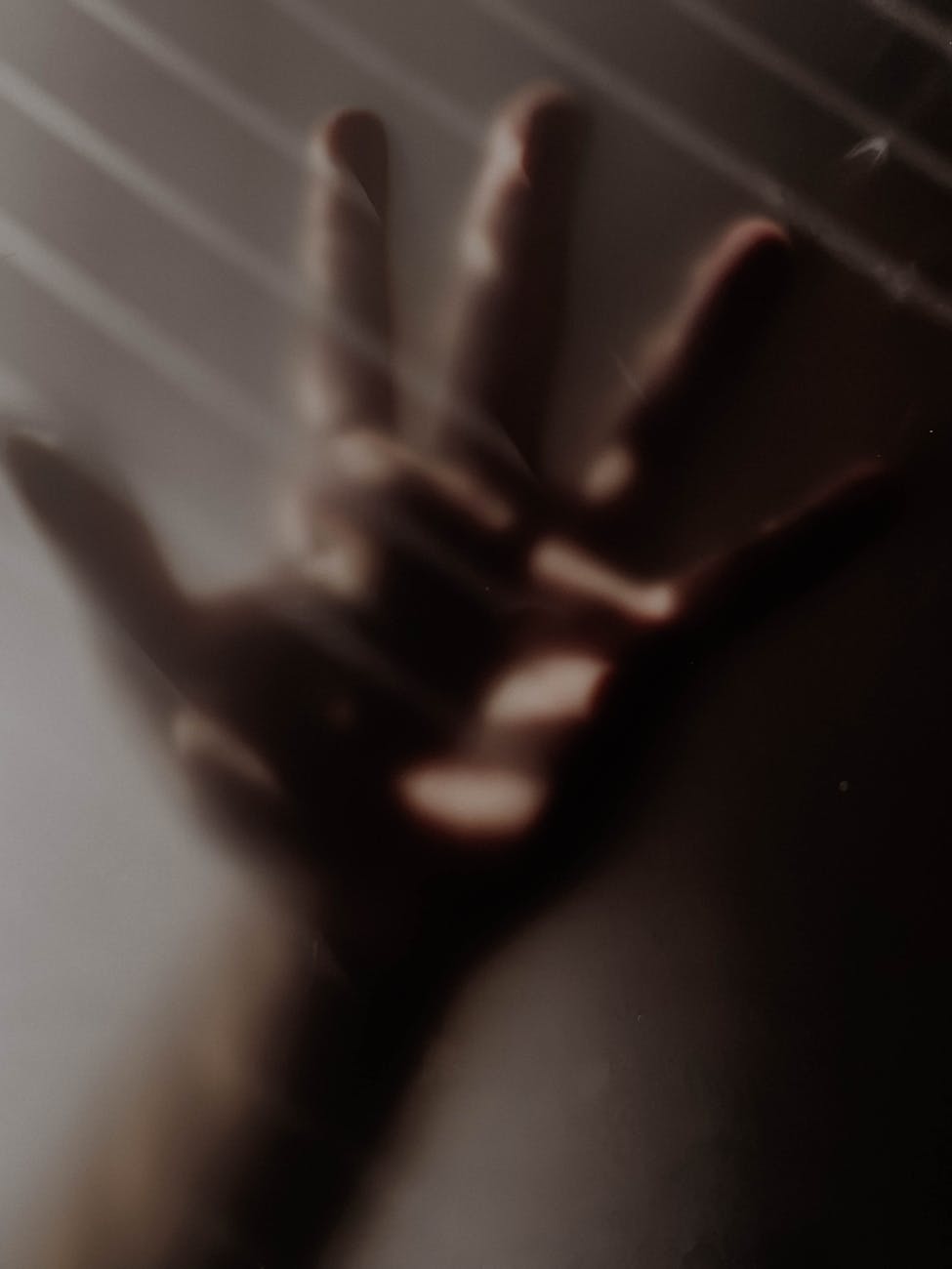 Abstract background with soft light lines suggesting movement and calm.